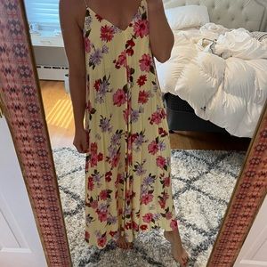 Yellow floral maxi dress with adjustable spaghetti straps from Zara